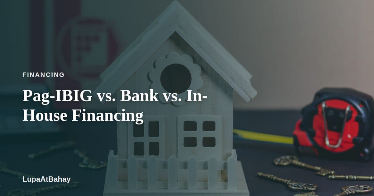 A white wooden model house on a dark table, surrounded by vintage keys and a tape measure, under the headline “Pag-IBIG vs. Bank vs. In-House Financing”.